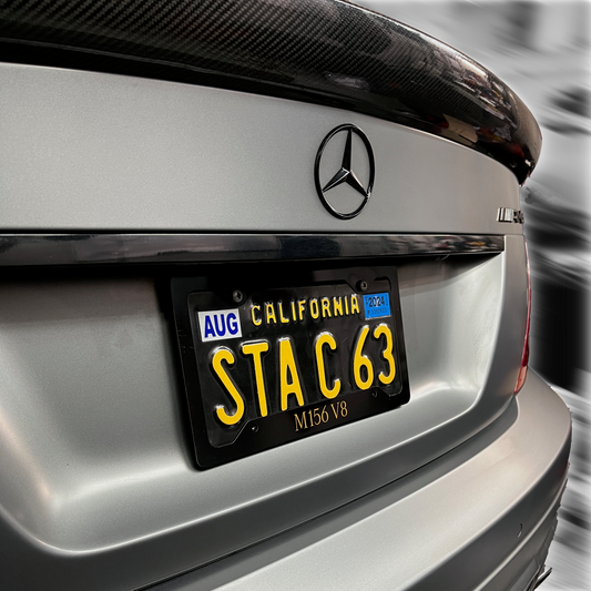 M156 V8 License Plate Frame - Yellow Text